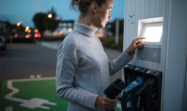 eMobility charging station eMobility women at charging station