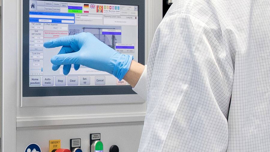 Precise operation man touching an industrial hmi with gloves